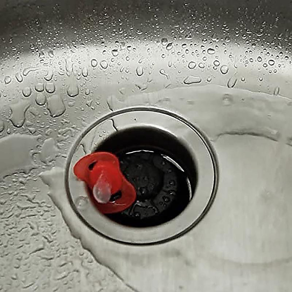 Danco - 9D00010051 - Disposal Genie 2-1/2 In. Black Plastic Garbage Disposal Strainer