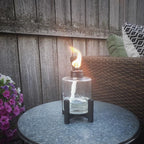 Tiki - 1120062 - Black/Clear Glass/Metal 6.5 In. Elevated Tabletop Torch 1 Piece